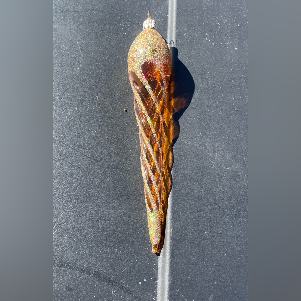 6 In Gold/amber Icicle Colored Glasslike Ornament With Glitter